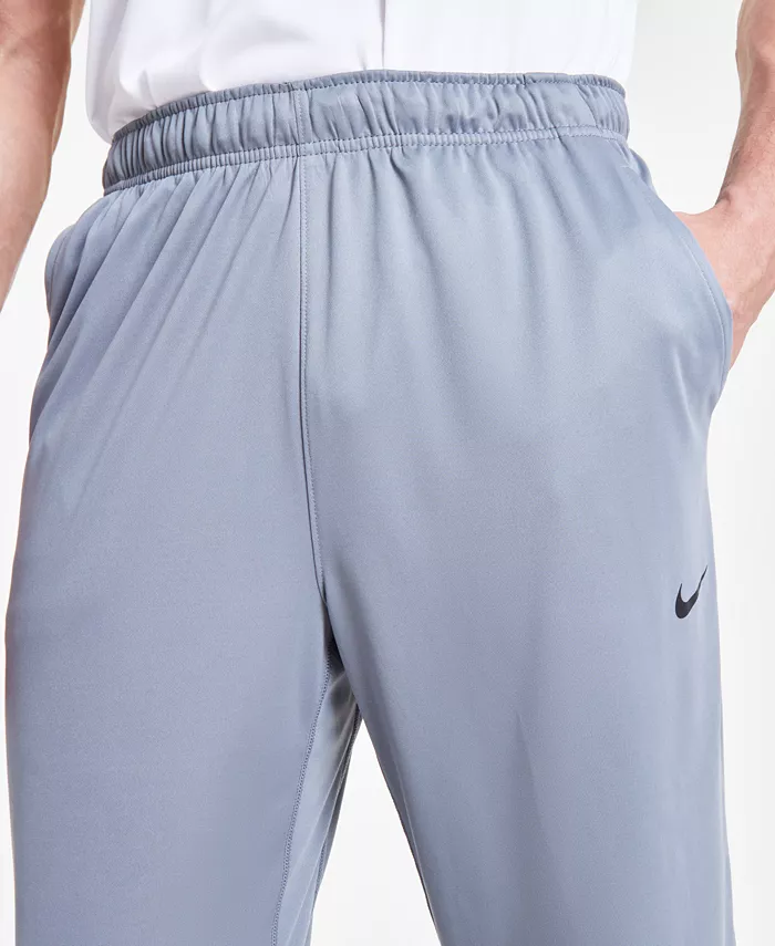 Nike Men's Totality Dri-FIT Open Hem Versatile Pants Men's Fashion & Accessories